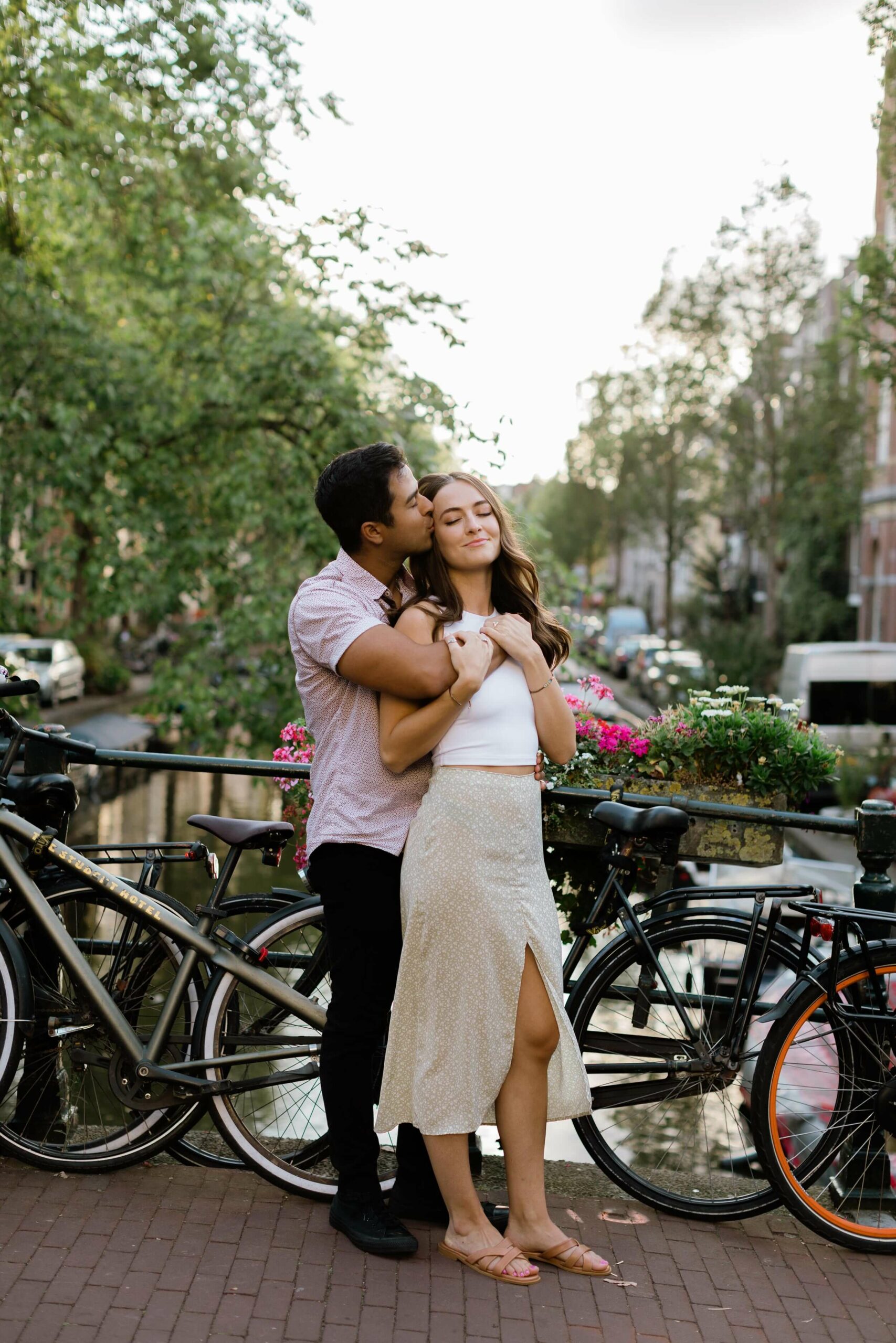 alt="tender embrace during couples engagement session in Amsterdam"