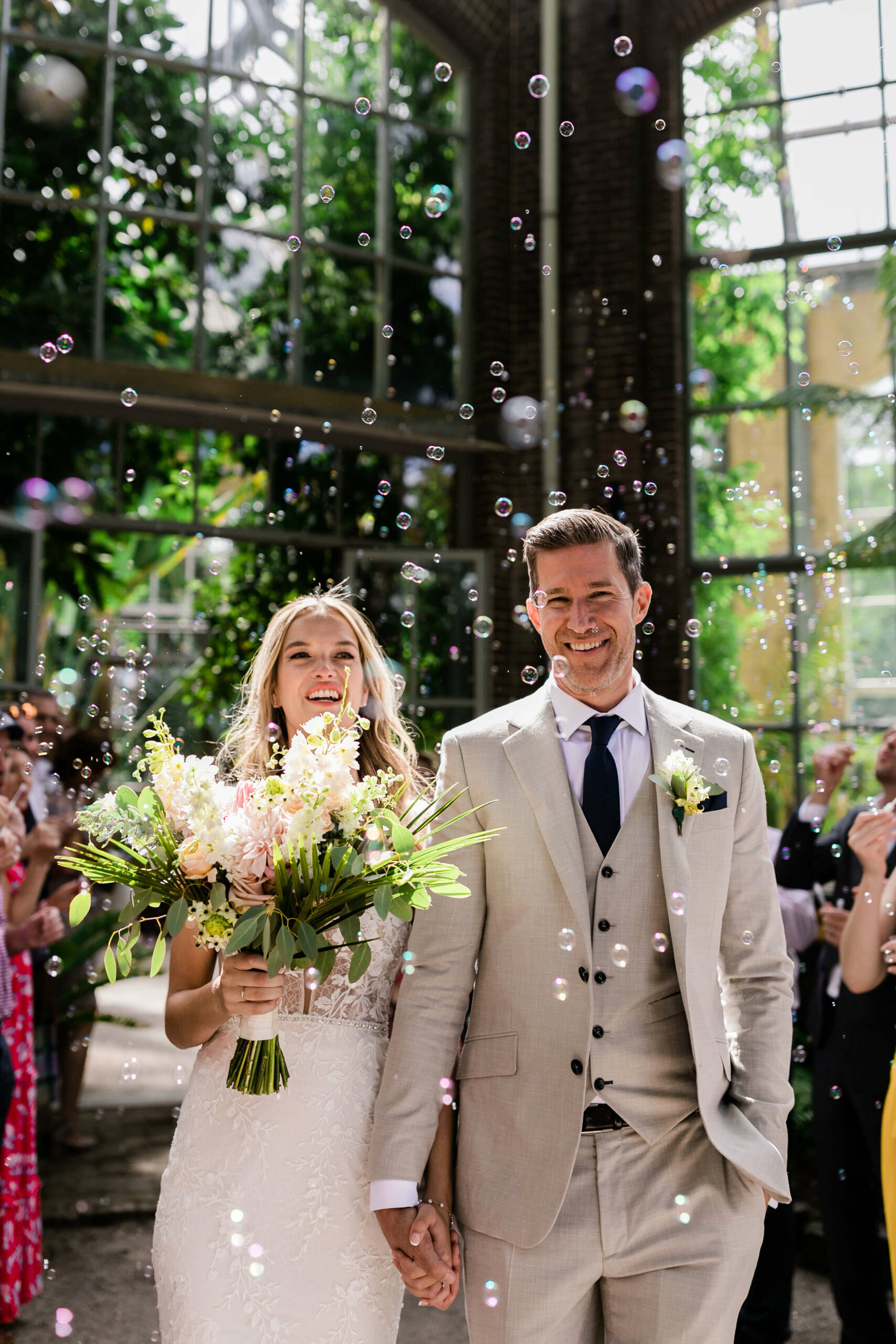 alt="summer wedding in de Hortus in Amsterdam newly wed happy couple portrait"