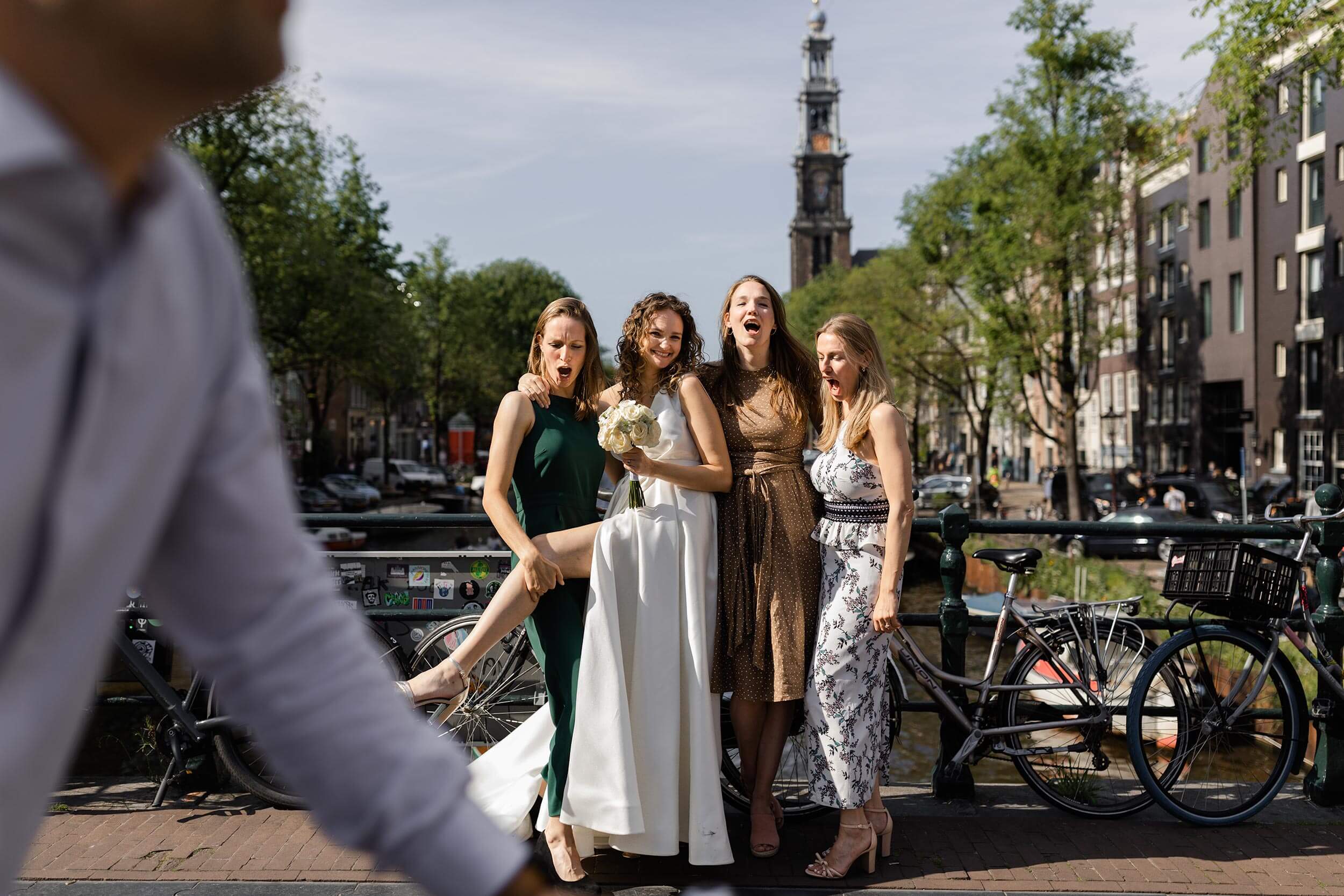 alt="summer Amsterdam wedding bride and bridesmaids"
